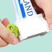 3Pieces Rolling Tube Toothpaste Squeezer Toothpaste Seat Holder Stand Rotate Toothpaste Dispenser for Bathroom (Mix Color)