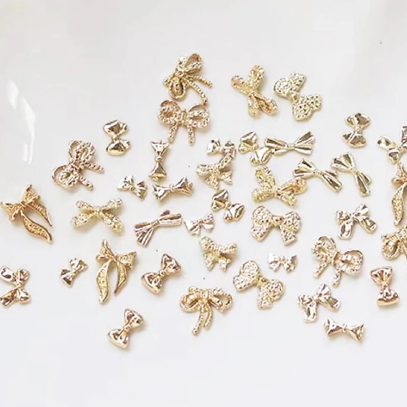 50/60Pcs/lot 3D Butterfly Alloy Nail Charms Bow-knot Design Jewelry Luxury Gold Silver Hollow Nail Art Decoration Accessory Bulk